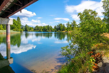 The Coeur d'Alene River as it runs through the Cataldo area along the White Pine Scenic Byway near...