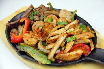 Grilled Steak Chicken Shrimp Fajitas Trio Skillet