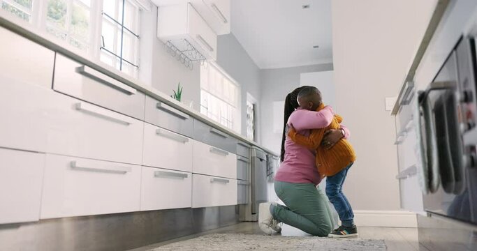 Hug, kitchen and black family child, happy mother and embrace, bonding and enjoy quality time together. Love, happiness and home mom, mama or African parents hugging, support and care for young kid