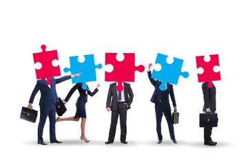 Concept of business people and jigsaw puzzle