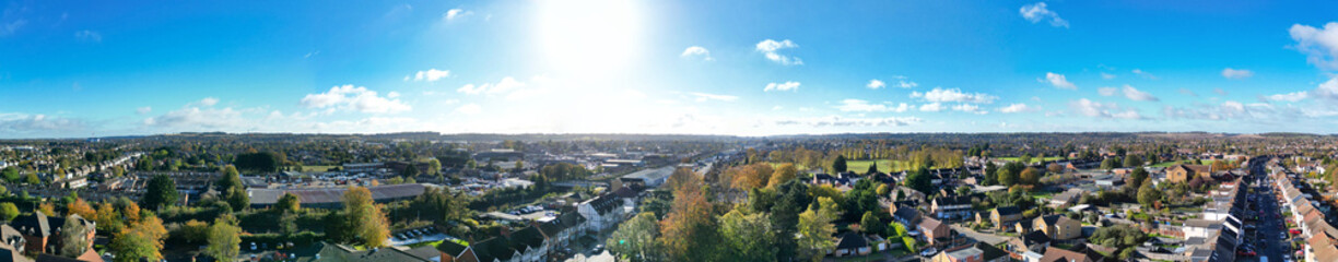 Fototapeta na wymiar High Angle Beautiful Panoramic View of North Luton Leagrave Town of England UK During Mostly sunny Day. The Footage Was Captured with Drone's Camera on November 7th, 2023