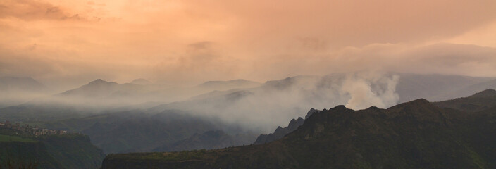 mountain and fog