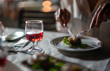 Baked mushrooms stuffed with seafood in a restaurant.