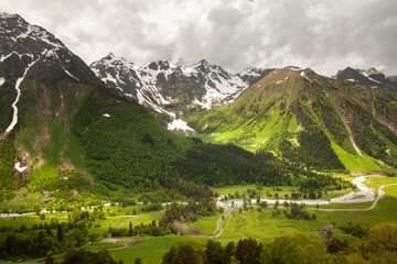 Winding to mountain peaks. Beautiful mountain landscape.
