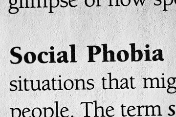 Social phobia, psychological disorder terminology printed in black on white paper close-up. medical treatment and therapy