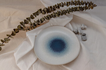 Blue and White Plate with Dried flowers on Calico. Beautiful arrangement.