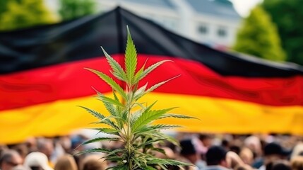 German flag with hemp leaf background. Cannabis legalization in Germany concept. Legal medical hemp plant marijuana.