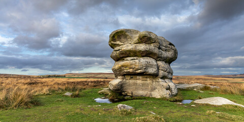 The large boulder known as Eagle Stone on moorland near Baslow Edge in the Peak District National Park, Derbyshire. © Jim