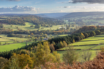 Fototapeta na wymiar A stunning autumn view from the end of Baslow Edge down the Derwent Valley in the Peak District National Park, England