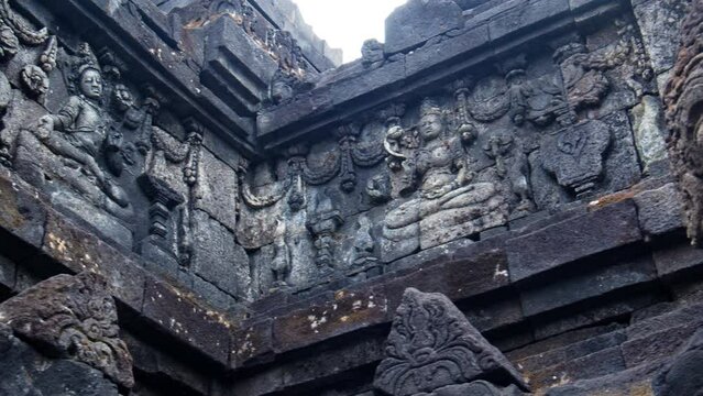 Ornament details and sculptures on the walls of the Buddhist temple Borobudur in Indonesia