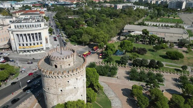 Aerial video of White Tower of Thessaloniki on the sea shore in Greece