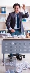Businessman rejecting new ideas with lots of papers