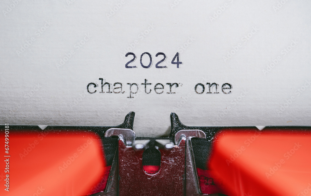 Fototapete old typewriter with following text on paper - 2024 chapter one. new years concept