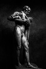 Fototapeta na wymiar Vertical of Silenus and Dionysus sculpture in Vatican Museum in grayscale