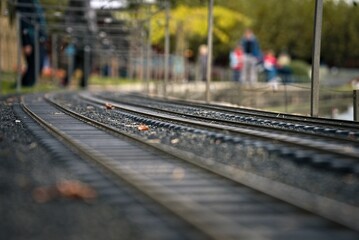 Fototapeta na wymiar Empty railway track against a blurry background.