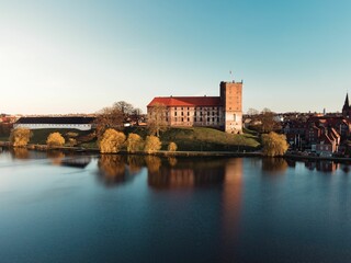 aerial of Koldinghus. A castle in Kolding, Denmark and the lake