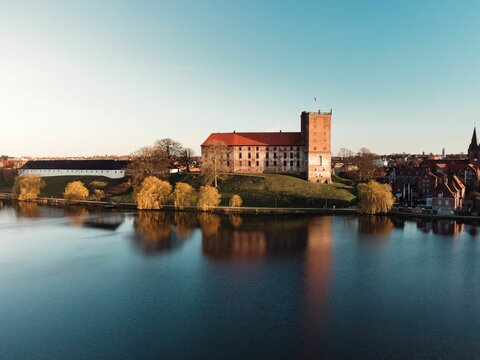aerial of Koldinghus. A castle in Kolding, Denmark and the lake