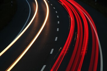 Nighttime urban landscape illuminated by a string of vibrant red light trails