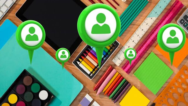 Animation of multiple profile icons floating against close up of school equipment on wooden table