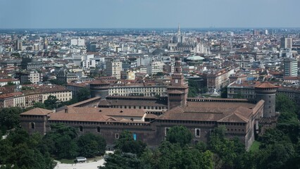 Obraz premium Aerial view of the bustling metropolis of Milan with skyscrapers
