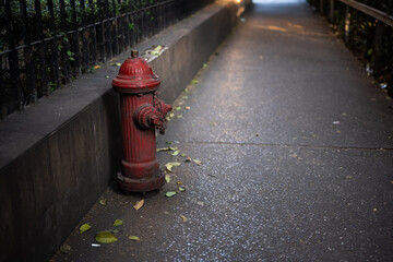 old red fire hydrant on sidewalk