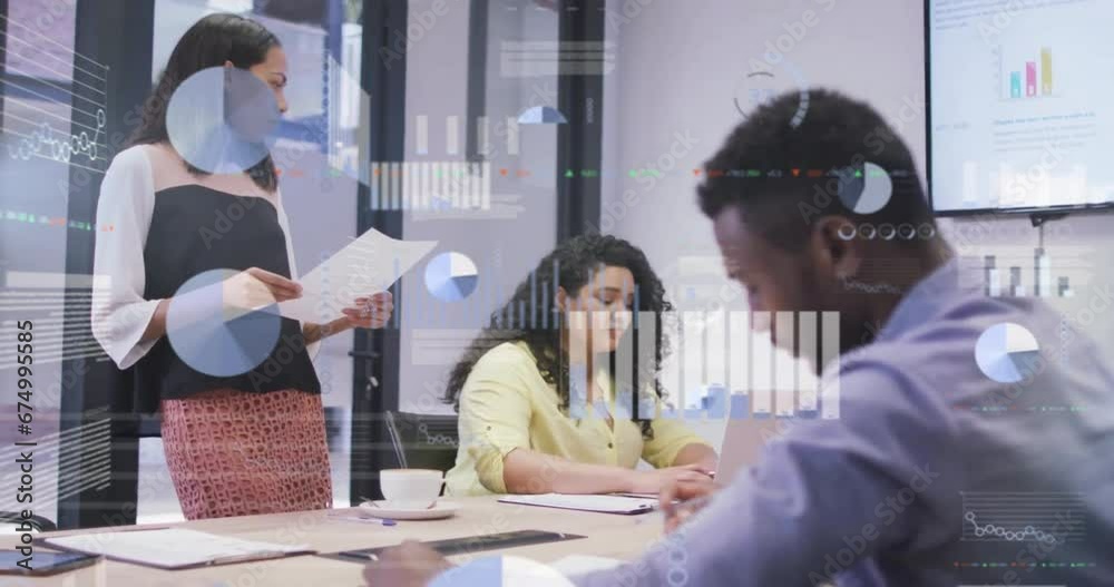 Wall mural animation of multiple graphs and trading board over diverse coworkers discussing report in office