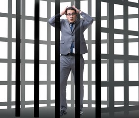 Businessman in the cage isolated on white