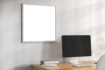 Square frame mockup in white interior with laptop on table