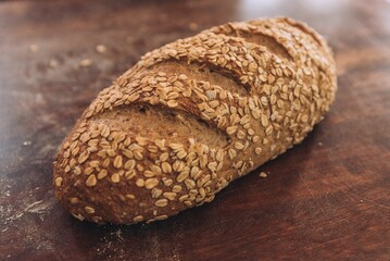 Close-up shotof a freshly-baked bread on a wooden table