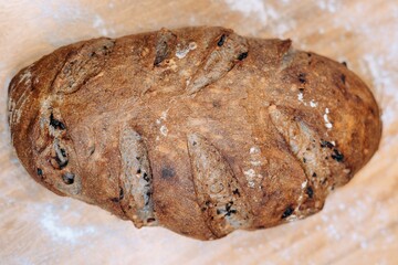 Close-up shotof a freshly-baked bread on a wooden table