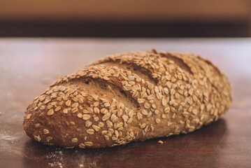 Close-up shotof a freshly-baked bread on a wooden table