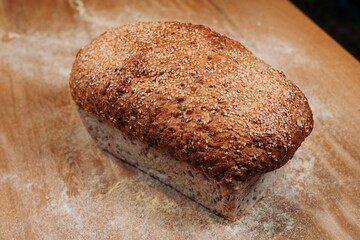Close-up shotof a freshly-baked bread on a wooden table
