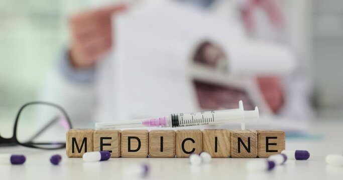 Word medicine is syringe and medical tablets in clinic