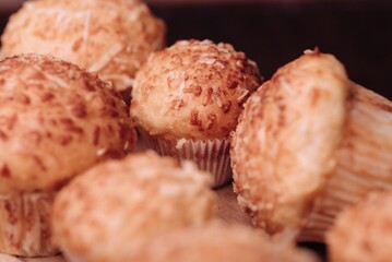 Plate of freshly-baked muffins, placed on a countertop