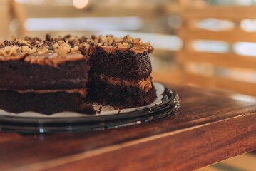 Delicious, freshly-baked cake sits atop a wooden table