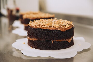 Delicious, freshly-baked cake sits atop a wooden table