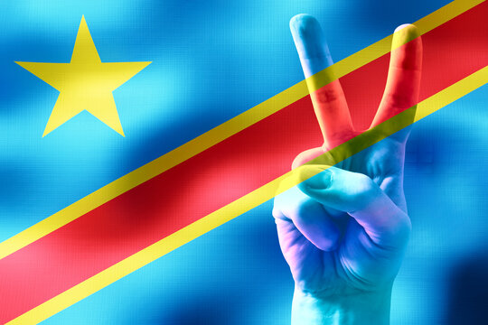 Democratic Republic of the Congo - two fingers showing peace sign and national flag - Powered by Adobe