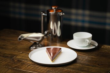 Closeup of a delicious chocolate cake on a wooden table