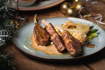 Closeup of steak served on a Christmas-themed table