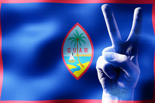 Guam - two fingers showing peace sign and national flag