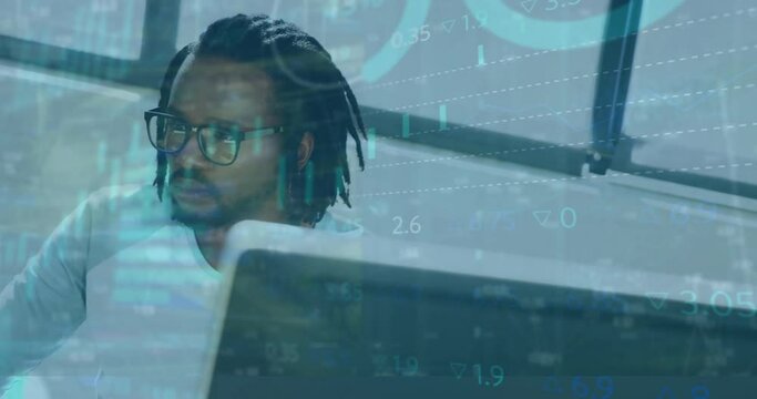 Animation of infographic interface over african american businessman with dreadlocks using computer