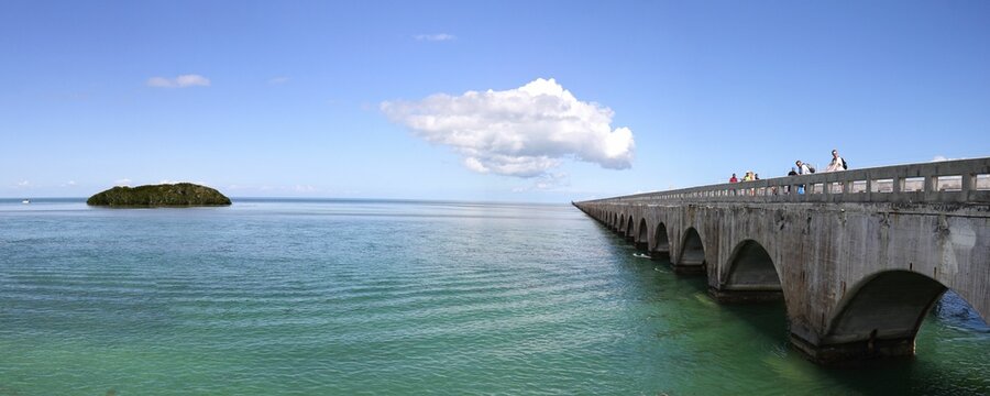 Scenic shot of a beautiful bridge spanning over a tranquil body of water in Key West in, Florida USA