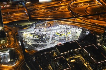 Aerial view of illuminated roads in Dubai at night, UAE.