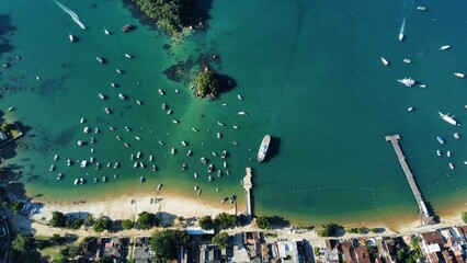 Aerial view of a tropical island and secluded bay in Ilha Grande, Rio de Janeiro - obrazy, fototapety, plakaty