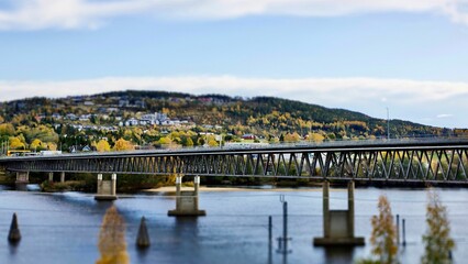 Obraz premium Fetsund bridge, Norway with mountains and the city on the background