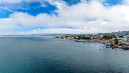 drone view of Monterey Bay, California with city and ocean