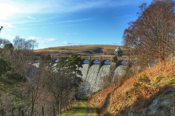 Stunning view of the Craig Goch Dam in the Elan Valley, Wales with lush green hills