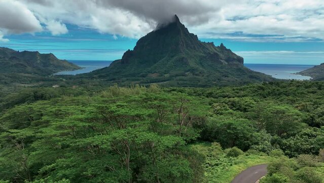 Spectacular Peak Of Mt Rotui On The Island of Moorea Near Tahiti In French Polynesia. Pullback Shot