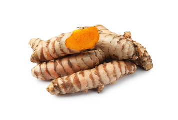Whole and cut turmeric roots isolated on white