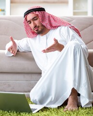 Arab man working at home on his work